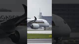 Singapore A350 Blasting out of Manchester in the wet!