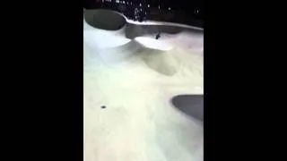 10 year old dropping in into the bowl at skatepark