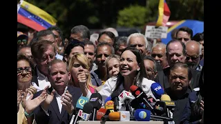 Venezuela's opposition leader is defiant in spite of court-ordered ban