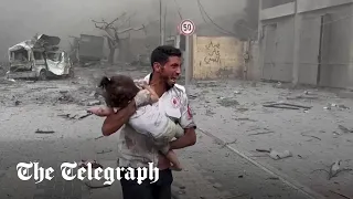 Gazans rescue children under rubble as bombing ensues