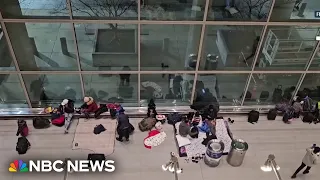 Migrants shelter inside Boston's Logan International Airport