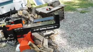 Demonstrating  my Ariens 22 ton log splitter and how it works.