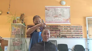 Long hair to buzz cut in salon