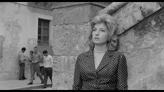 L'Avventura (1960) Monica Vitti is surrounded by the men of the town