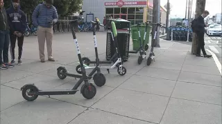 Dockless bike shares and scooters litter city streets