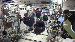 Astronauts show off 'synchronized space swimming' skills on space station