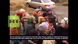 Ukraine: Russia's Night Wolves gang bring aid to a Lugansk village