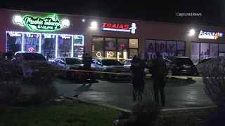 3 shot outside Wauekgan strip mall