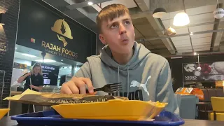 Lad rates takeaway at Rajah foods in Barnsley.