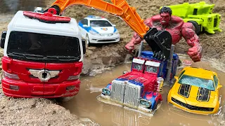 TRANSFORMERS STOP MOTION MOVIE - Bumblebee, Optimus& Tobot Robot Excavator Transporting Lego fossils