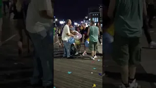 Hippies At Phish Concert in AC trash Boardwalk with Nitrous Oxide Balloons