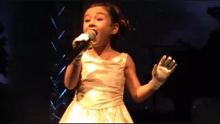 7 yr old Rhema's First Live Christmas Performance 2009 - plz "Share"