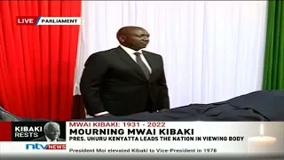 Deputy President William Ruto views Kibaki's body at parliament buildings