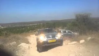 BMW X3 climbs a huge rock