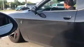 drifting a hellcat challenger on the intersection