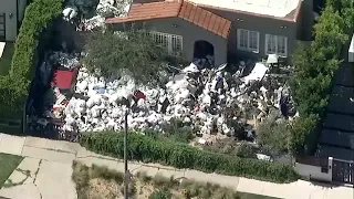 Massive pile of trash outside home in Fairfax District sparks concern