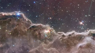 4K “Cosmic Cliffs” in the Carina Nebula - Webb Space Telescope Fly-Through (NIRCam+MIRI Composite)