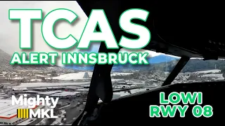 TCAS alert during RNP Z approach towards runway 08 Innsbruck (LOWI INN).