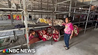 Displaced families in Gaza living in a chicken coop for safety