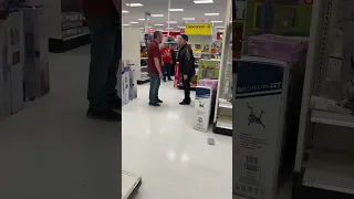 Target Employee Pushes Customer Over Toy Cars!