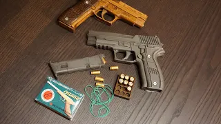 3D printed rubber band gun with shell ejection (SigSauer P226)