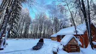 Snow covered the log cabin. Conducted electricity in the bath