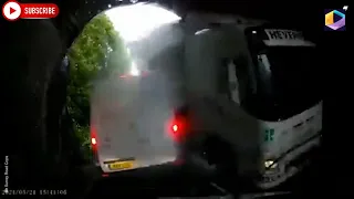 Police release dashcam video showing moment HGV crashes in bridge and nearly crushes van in Surrey