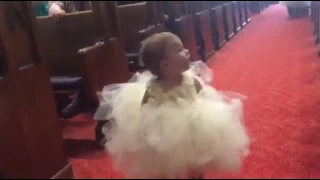 Bride and groom's daughter as flower girl...when she sees her daddy!