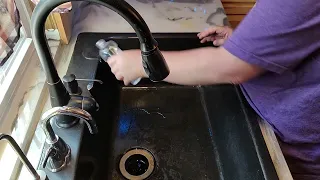 Cleaning black granite sink with mineral oil