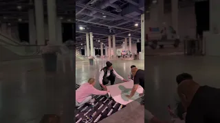 Lvl up Expo 2023 Floor wrap install with Little Squeegee