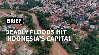 Nine dead after Indonesian capital hit by New Year flooding | AFP