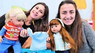 Bebek videoları. Baby Born oyuncak bebek için kıyafet seçelim. Evcilik oyunu.