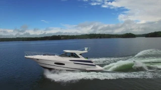 Austin Keen wake surfing behind a Regal 46 Sport Coupe