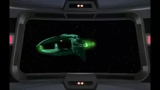 Romulan Warbirds attacking Voyager