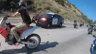 Cop tries to stop group of bikers.. Then this happens....