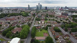 Aerial drone footage Cityscape of Manchester England