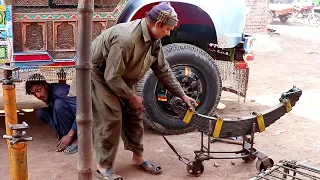 A suspension repair expert with surprising spring carrier trolly