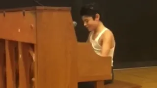 Kid performs Bohemian Rhapsody