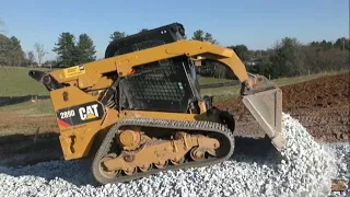 CAT 289D Spreading Stone for a New Driveway