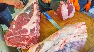 Italian Grill Master Cuts and Roasts Huge 'Bistecca alla Fiorentina'. Italy Street Food
