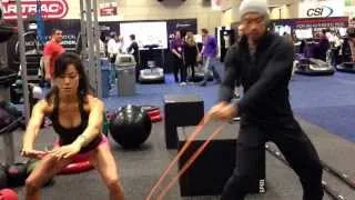 Testing out the new SPRI Fitness resistant bands at the IHRSA 2014 in San Diego w/my brother