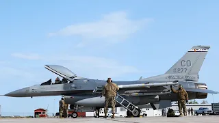 Canadian CF-18 Hornet and U.S. F-16 Fighting Falcon Fighter Aircraft