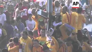 Chaotic scenes as thousands of faithful join Black Nazarene procession