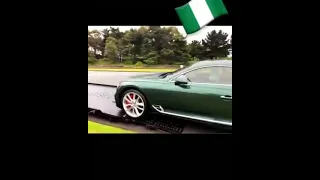 Nigerian MMA fighter, Israel Adesanya surprises his dad with a Bentley after he saw him admiring