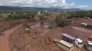 Officials visit area after flash floods in Kenya kills dozens of people