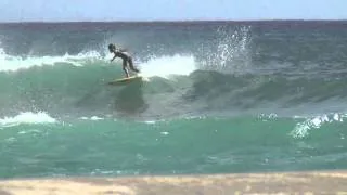 9 YEAR OLD SURFER DIEGO FERRI ON OAHU SOUTH SHORE