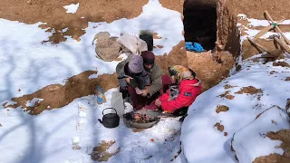 Heavy snow and the help of a kind cameraman to nomadic mother and her daughters