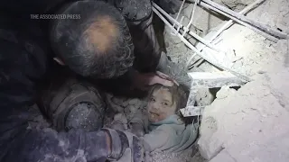 Child rescued from rubble after Syria quake