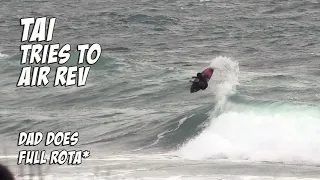 Tai tries frontside air reverse. Dad does full rota