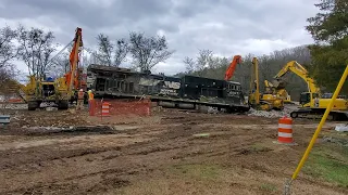 Derailed lead locomotive 4067 is lifted back onto the tracks!!